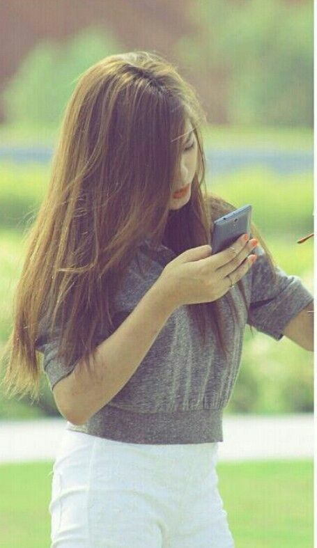 Moody girl using mobile with Attitude Dp Hd
